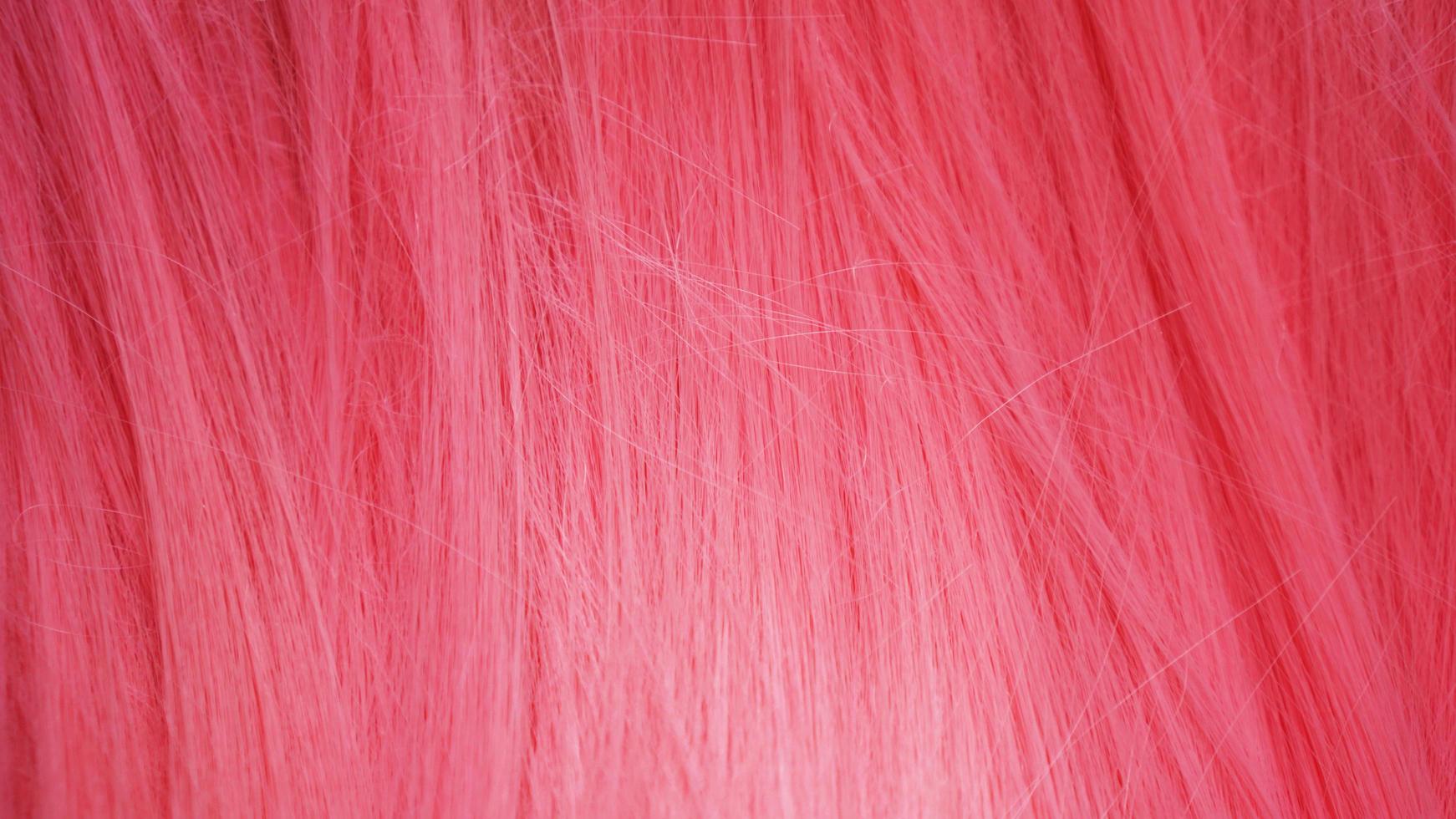 textura de cabelo rosa closeup. pode ser usado como fundo foto