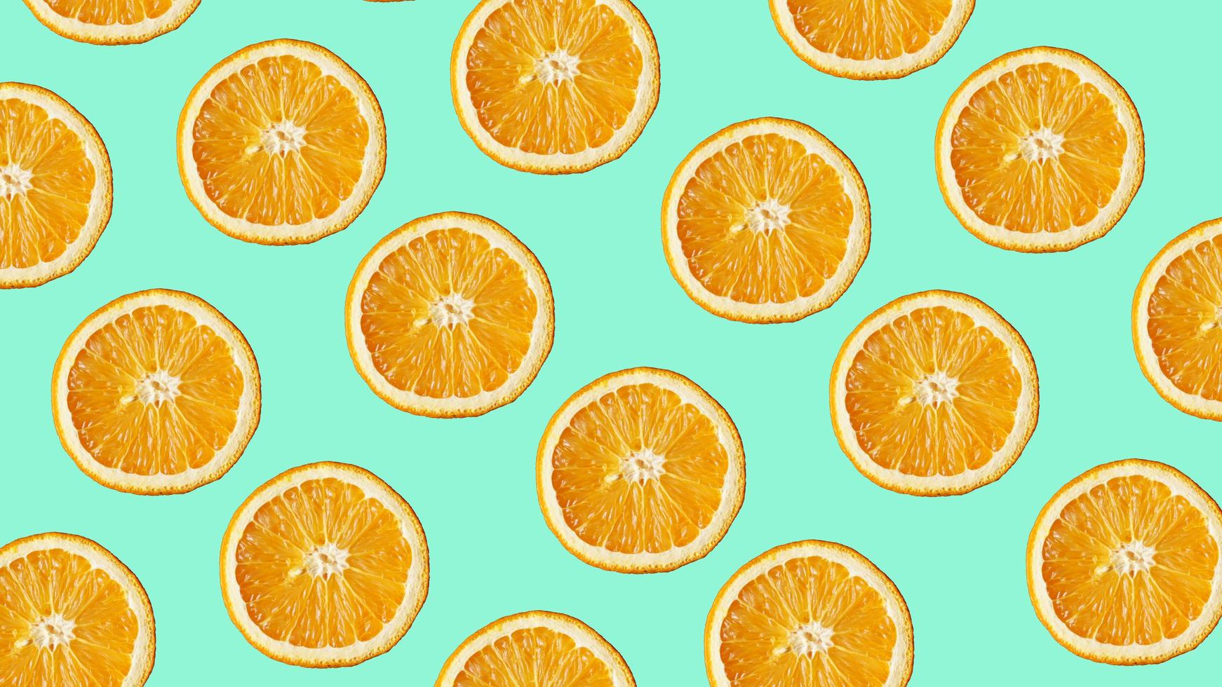 padrão de frutas coloridas de fatias de laranja frescas em azul foto
