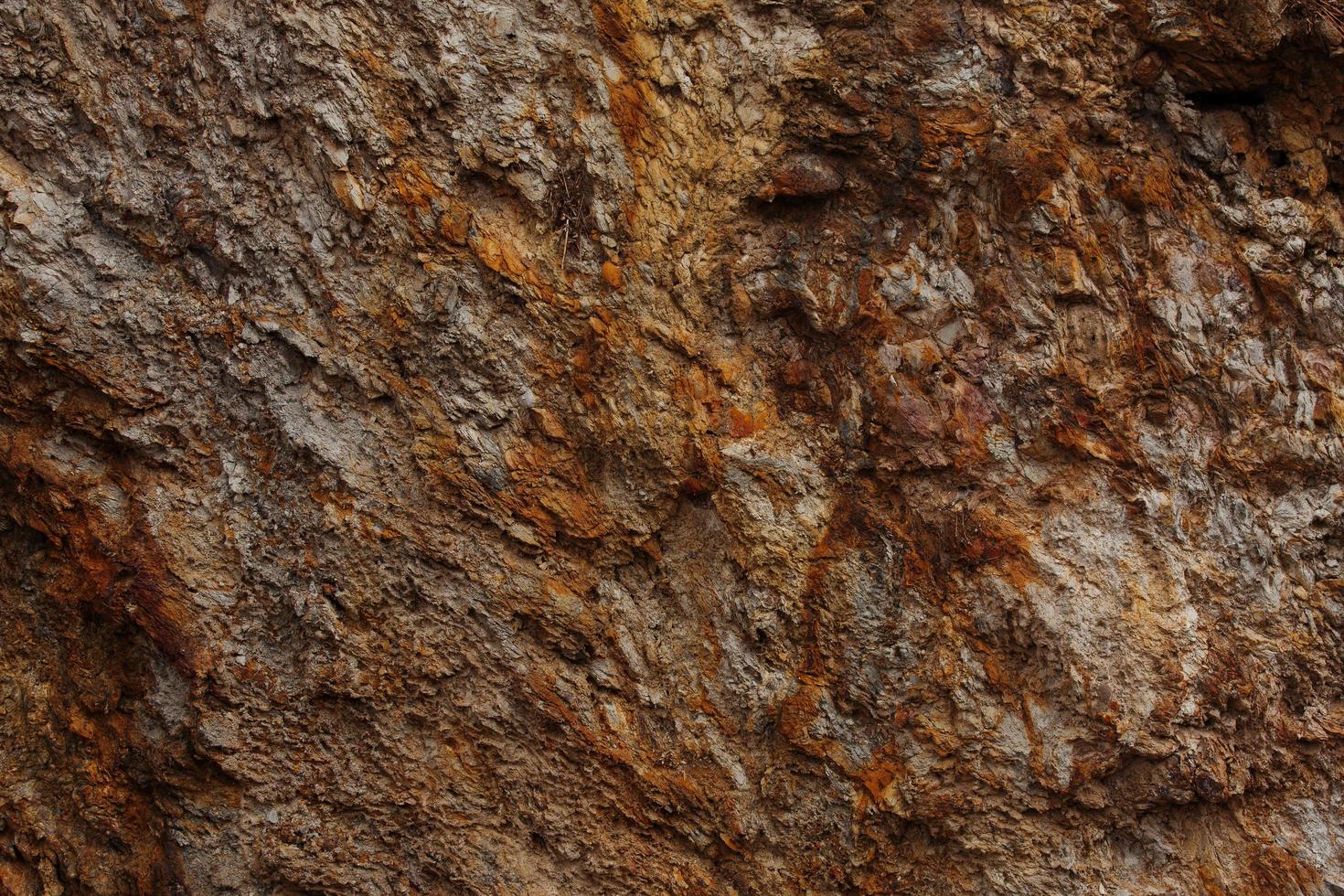 superfície de pedra bruta áspera cor marrom foto