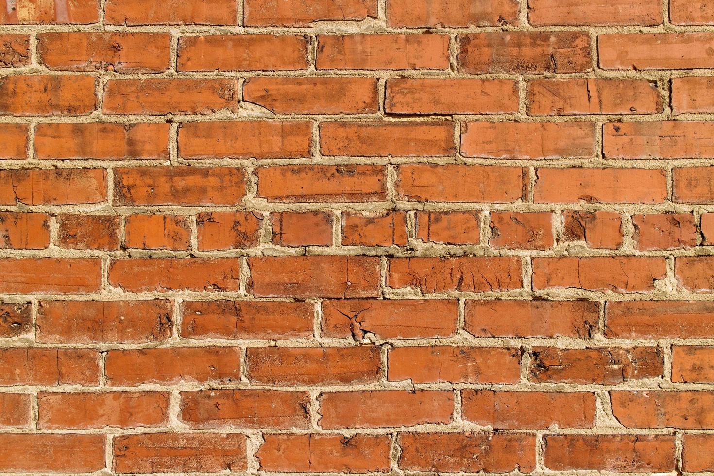 fundo de textura de parede de tijolo antigo. foto