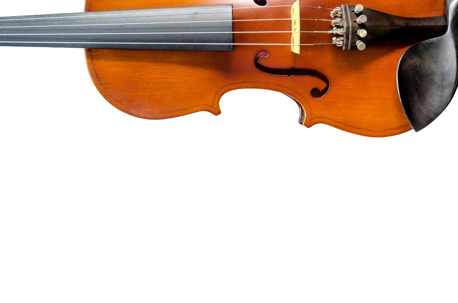 o violino na mesa, close-up do violino no floo de madeira foto