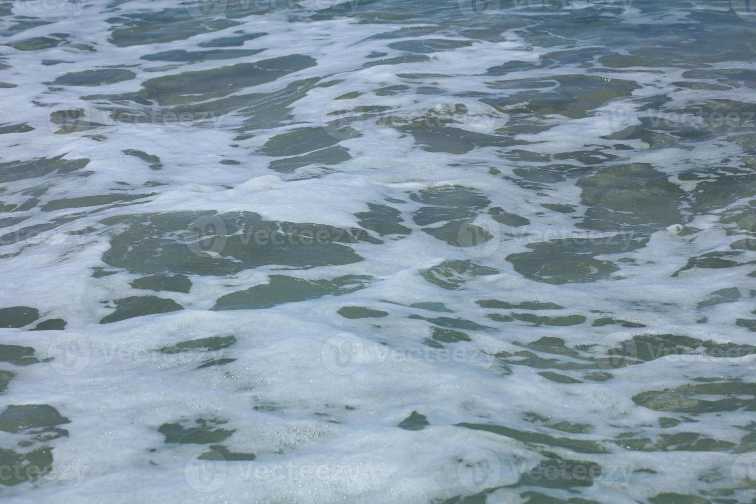 cristal do mar cor da água do verão fundo covid-19 falassarna beach foto