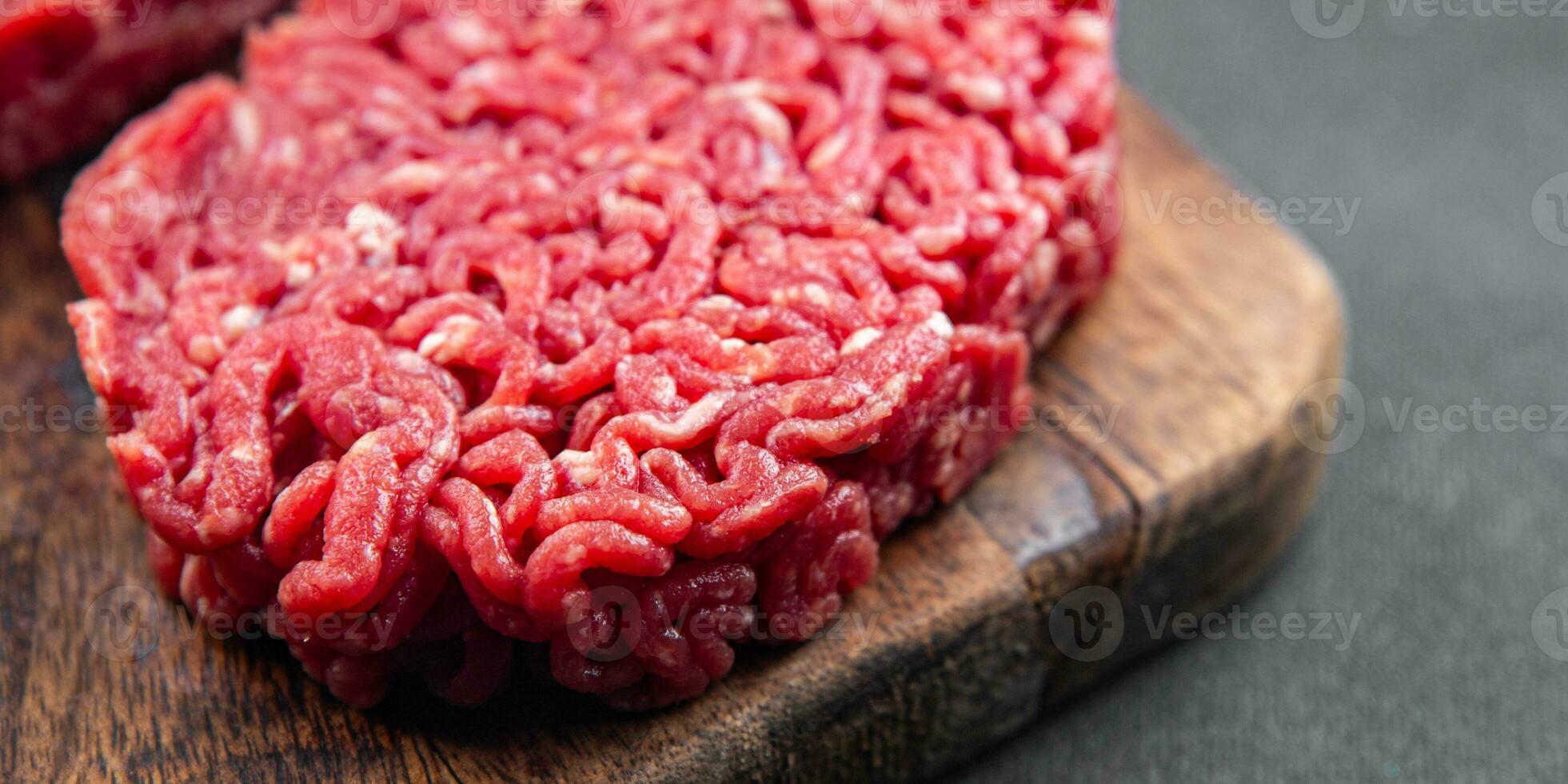cru costeleta carne fresco carne Hamburger cozinhando refeição Comida lanche em a mesa cópia de espaço Comida fundo rústico topo Visão foto
