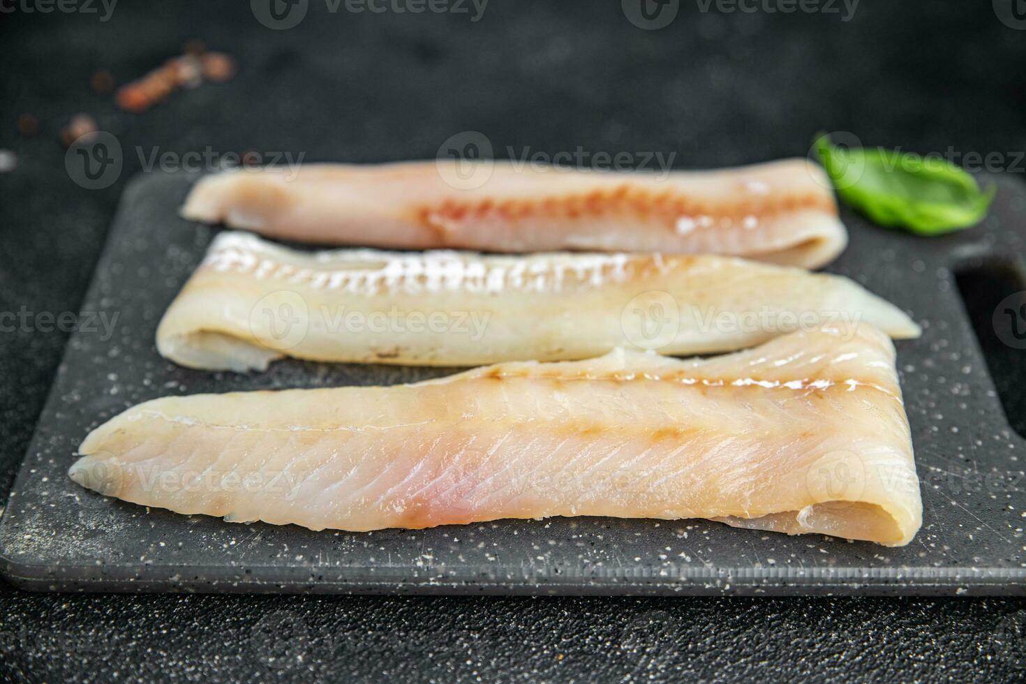 cru peixe filé azul badejo fresco frutos do mar saudável comendo cozinhando refeição Comida lanche em a mesa cópia de espaço Comida fundo rústico topo Visão foto