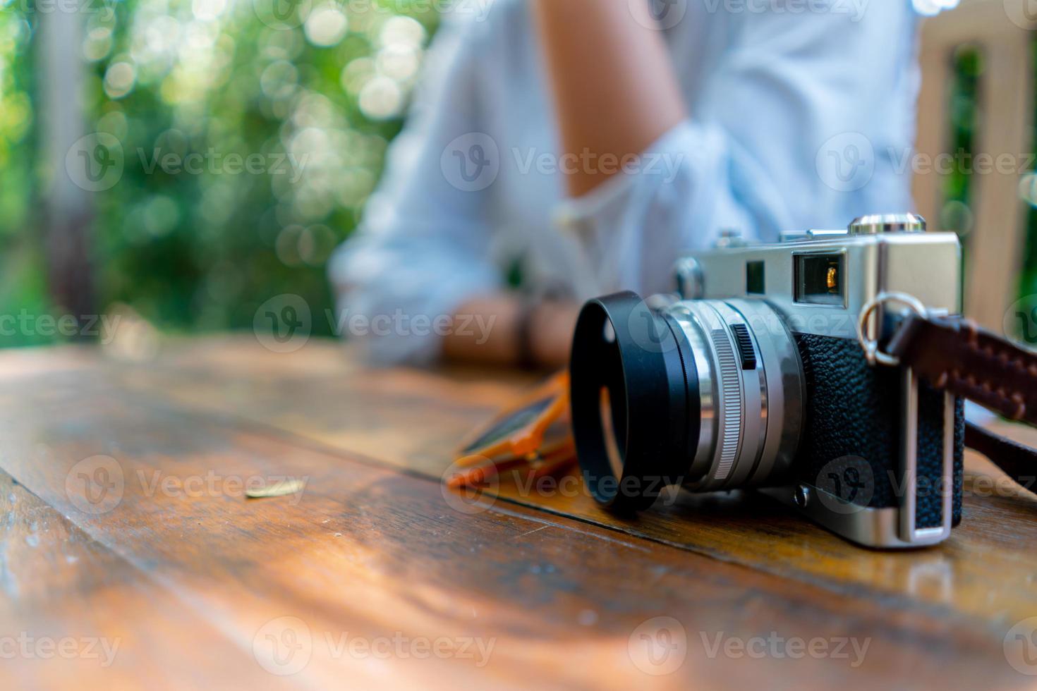 câmera vintage e fotógrafo foto