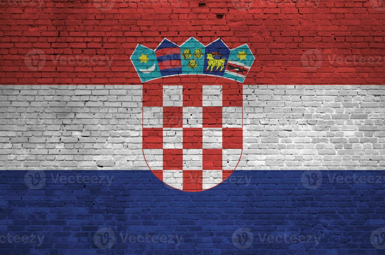 Croácia bandeira retratado dentro pintura cores em velho tijolo muro. texturizado bandeira em grande tijolo parede alvenaria fundo foto
