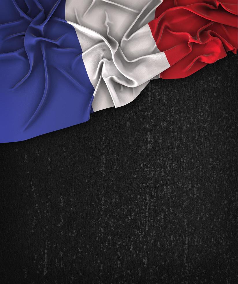 Bandeira da França vintage em um quadro negro grunge foto