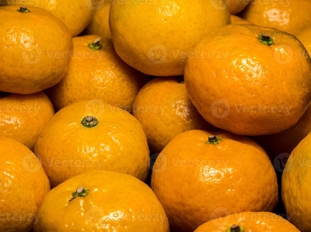 textura de superfície brilhante de frutas frescas de laranja foto