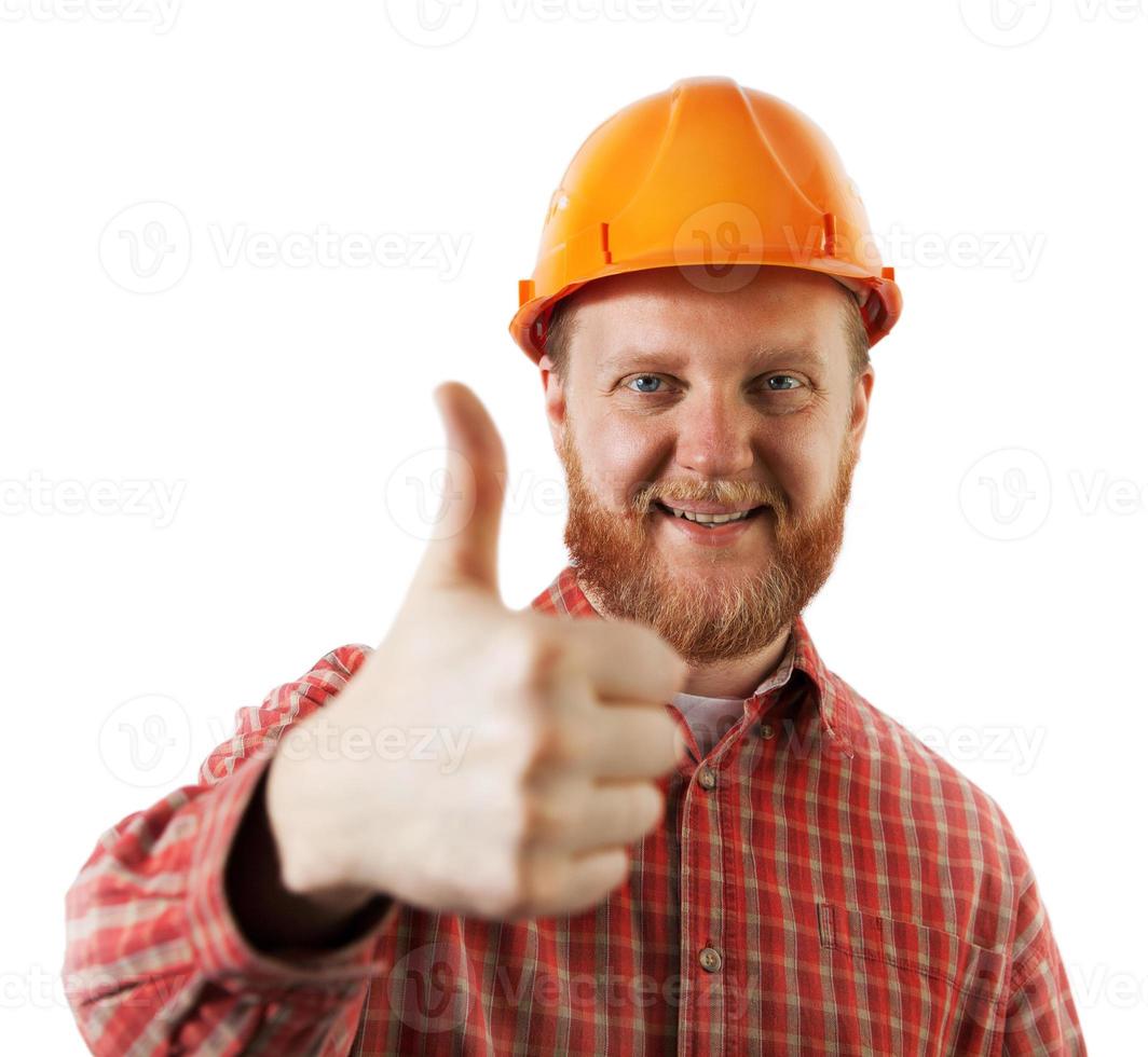 homem com um capacete protetor de construção foto