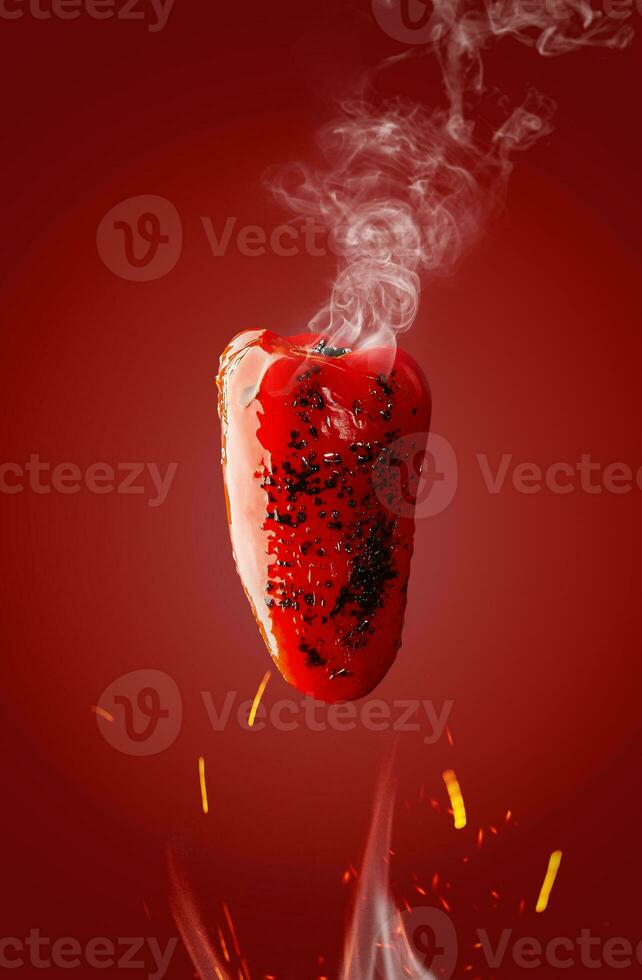 grelhado Pimenta pairando sobre chamas com faíscas em vermelho fundo foto