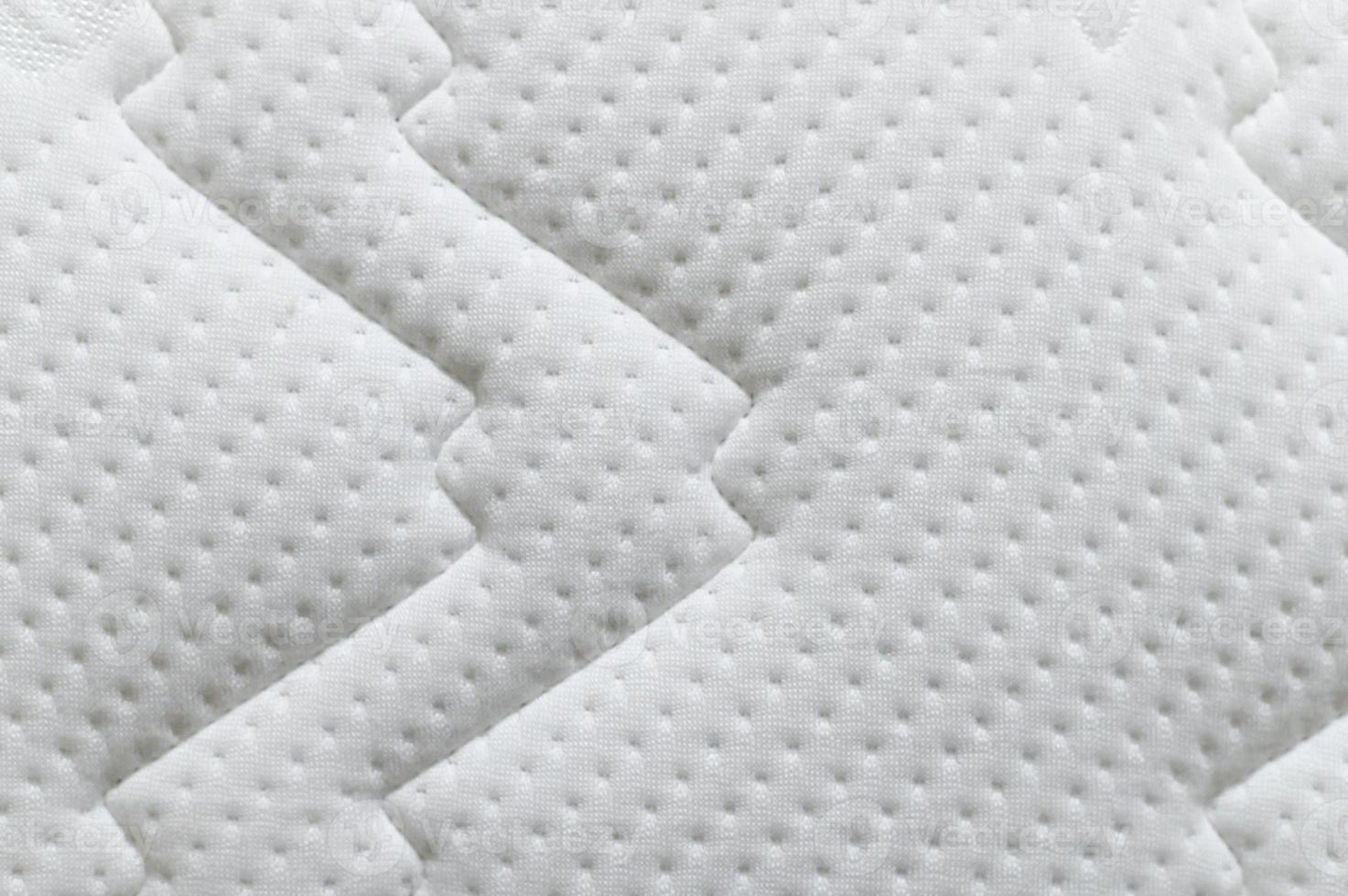 close up do fundo branco da textura do colchão foto