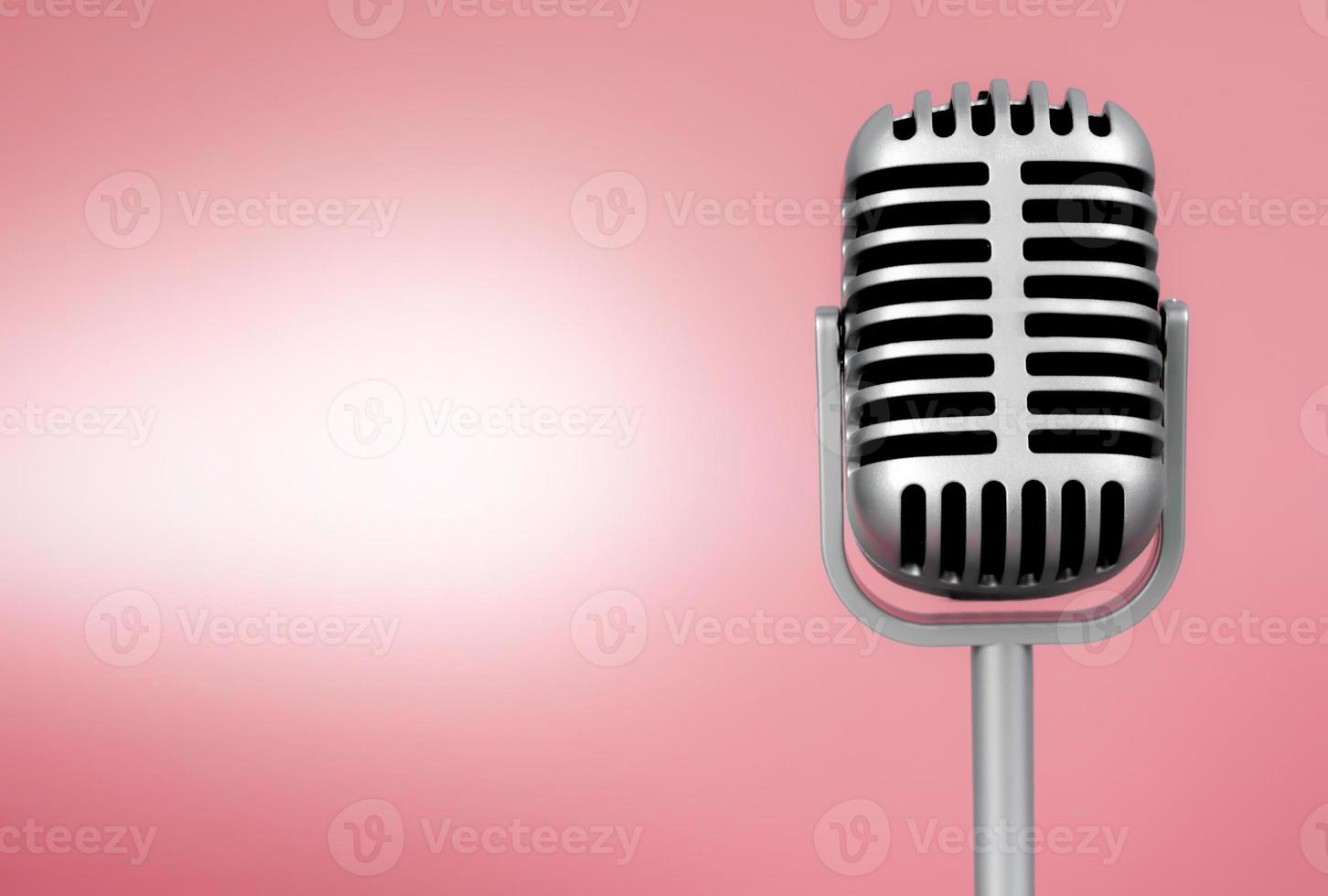 microfone retrô com espaço de cópia em fundo rosa foto