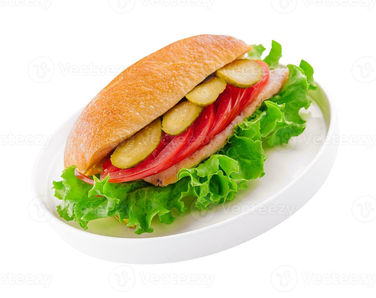 sanduíche com costeleta, tomates e em conserva pepinos foto