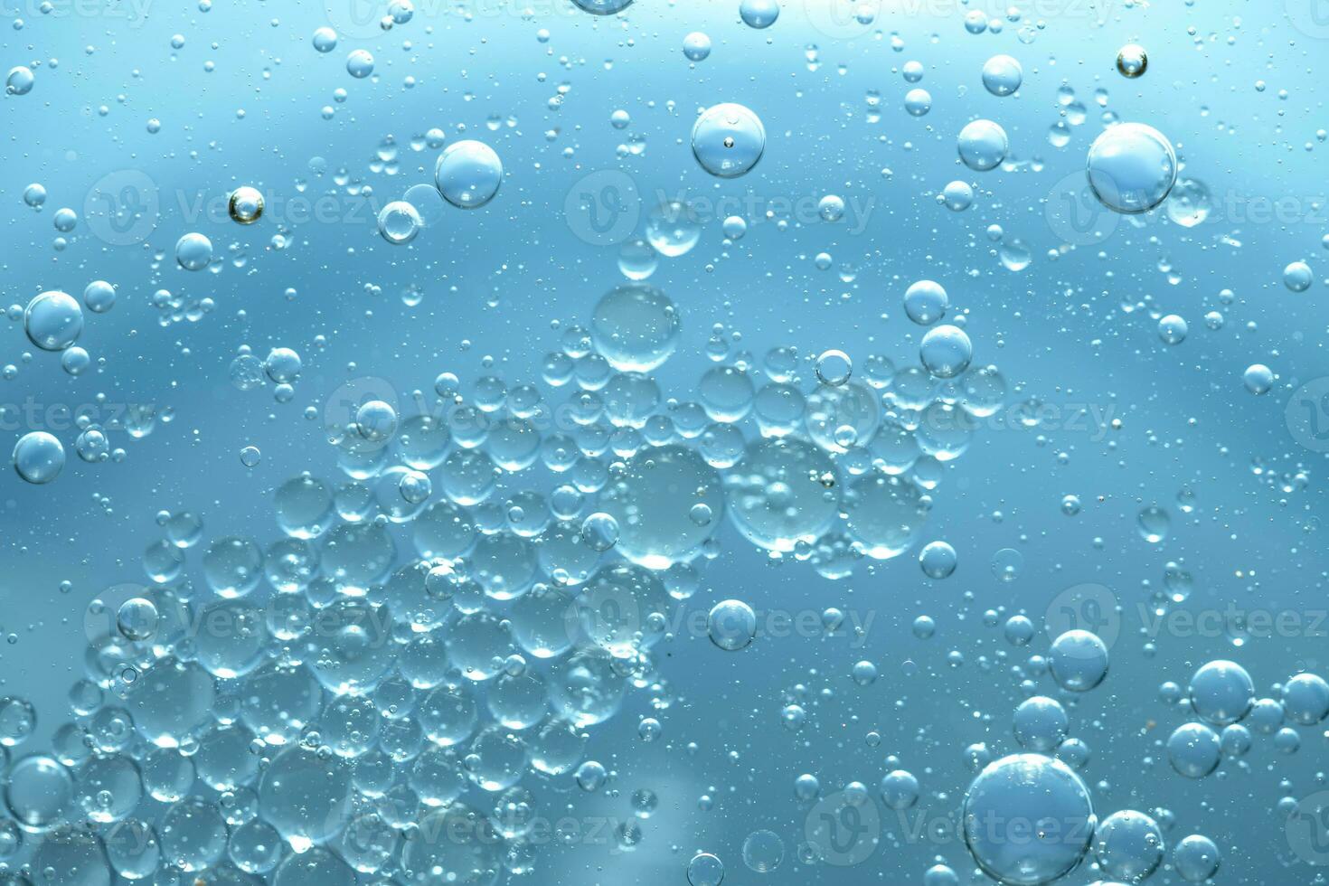 água bolha textura em azul fundo foto