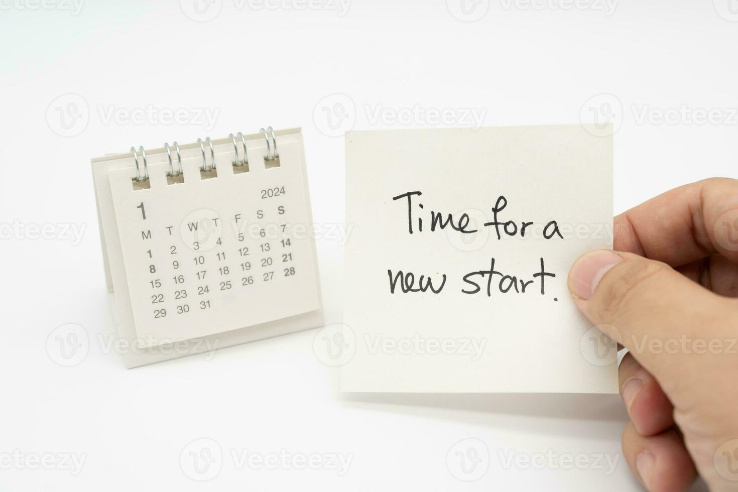 Tempo para uma Novo começar texto em papel com 2024 jan calendário, o negócio conceito. Novo ano Novo começar. foto