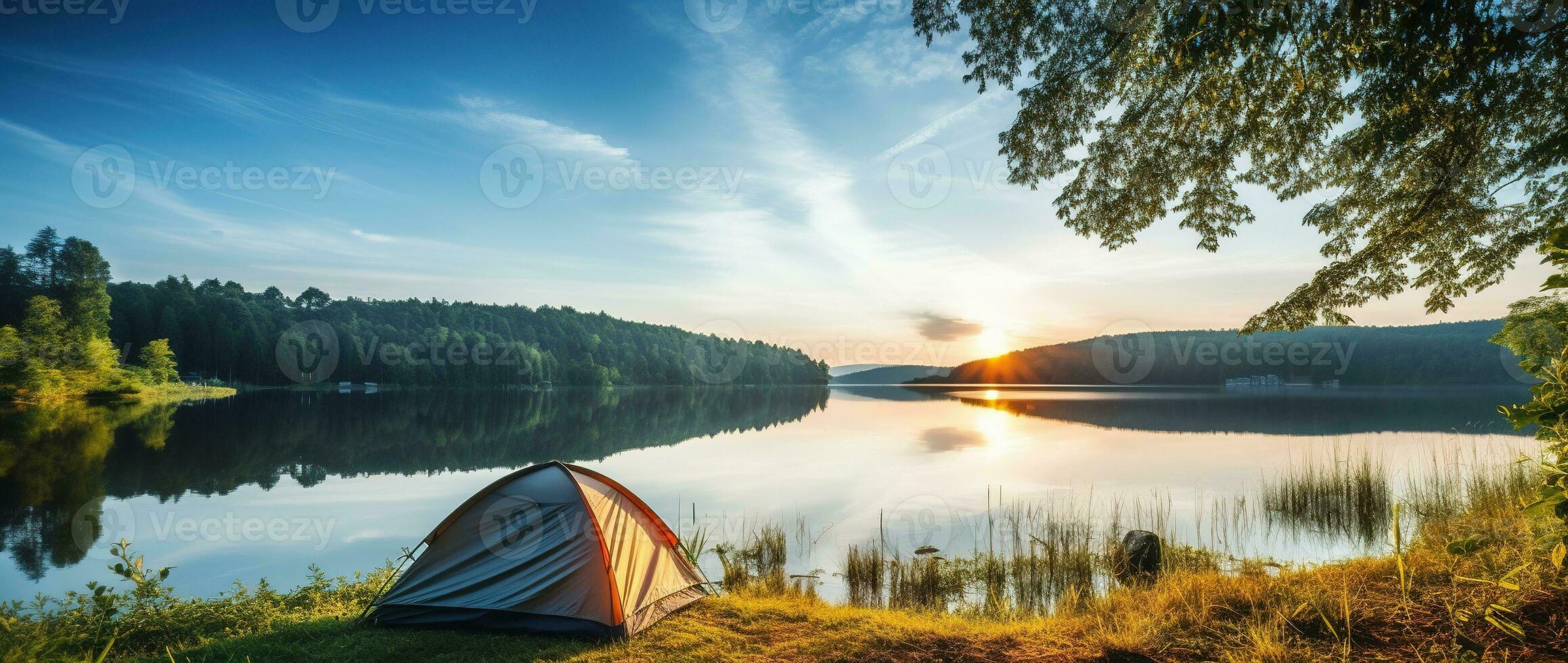 ai gerado acampamento barraca em a costa do uma lago às pôr do sol. foto