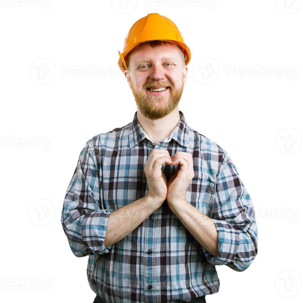 homem com um capacete mostrando as mãos do coração foto