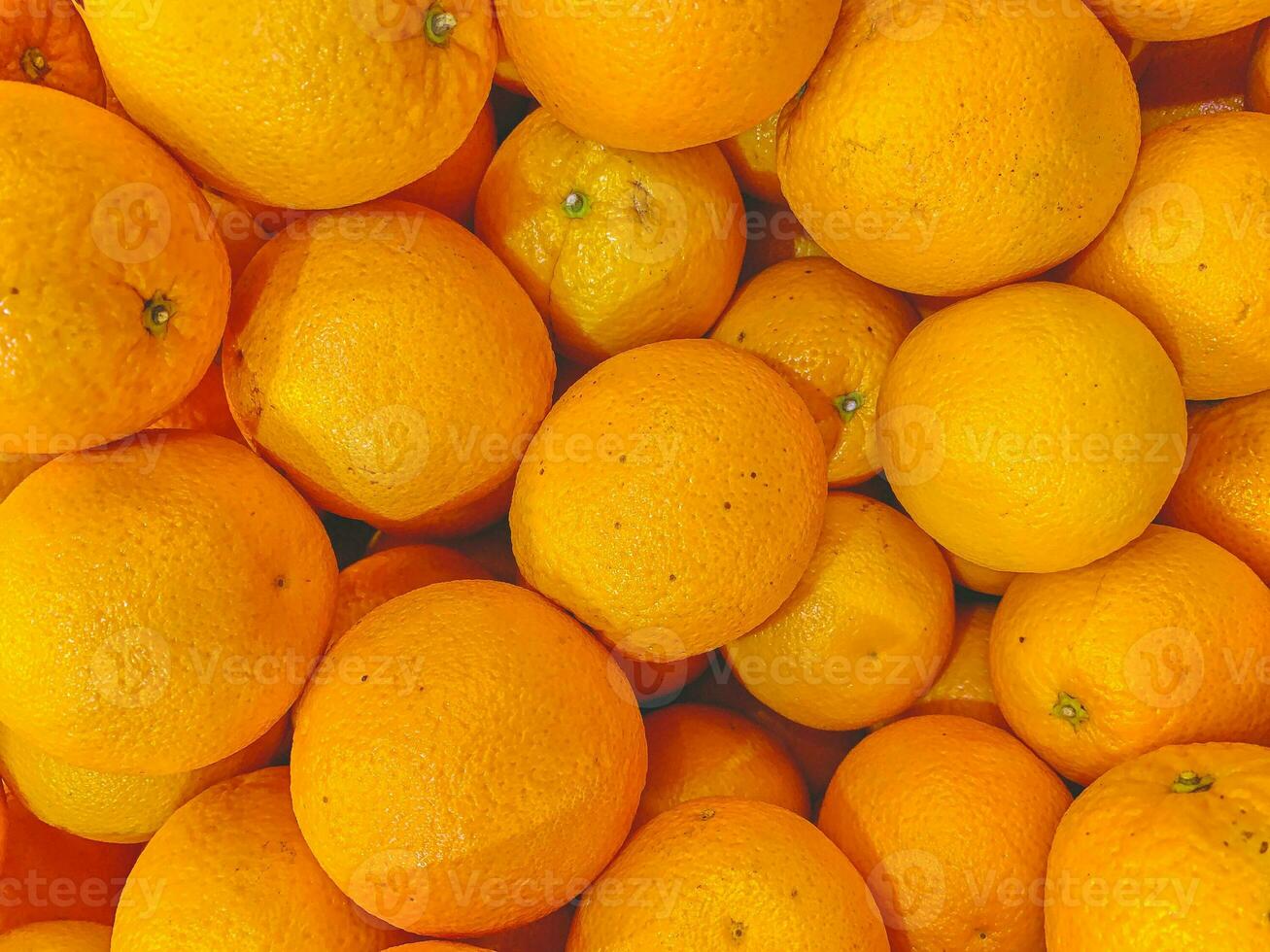 fresco mandarim laranjas textura. macro imagem do grande quantidade do lindo laranjas. foto