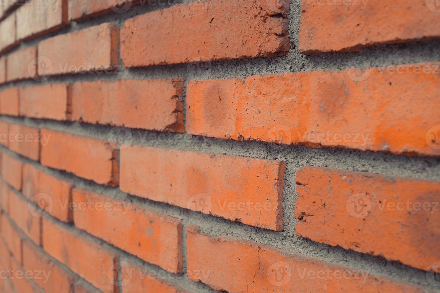 fundo de parede de tijolo antigo feito de textura de superfície de parede de tijolos foto