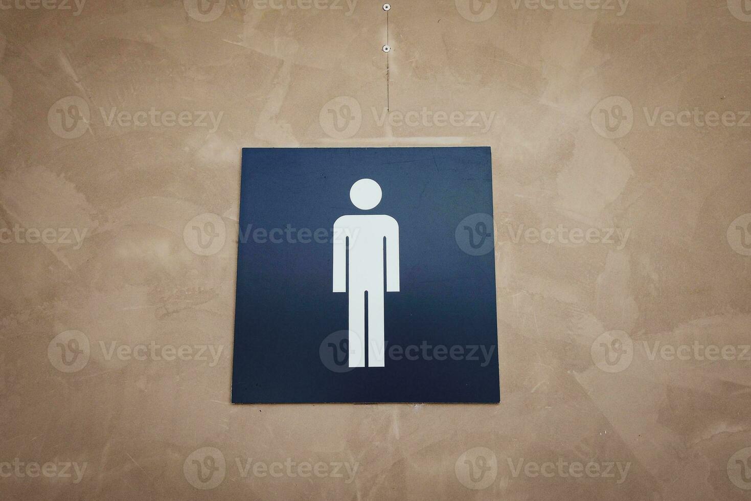 sinal masculino na frente do banheiro foto