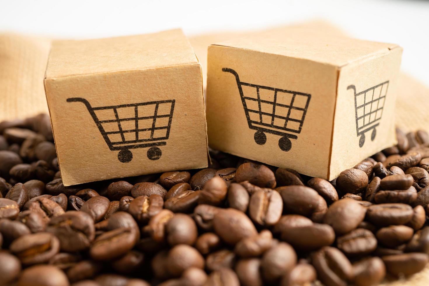 caixa com o símbolo do logotipo do carrinho de compras em grãos de café, importação e exportação compras on-line ou entrega de produtos da loja de serviço de entrega de comércio eletrônico, comércio, conceito de fornecedor foto