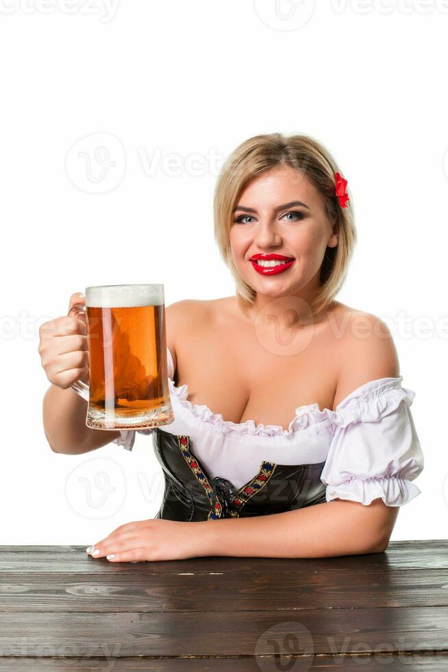 lindo jovem loiro menina do oktoberfest Cerveja stein foto