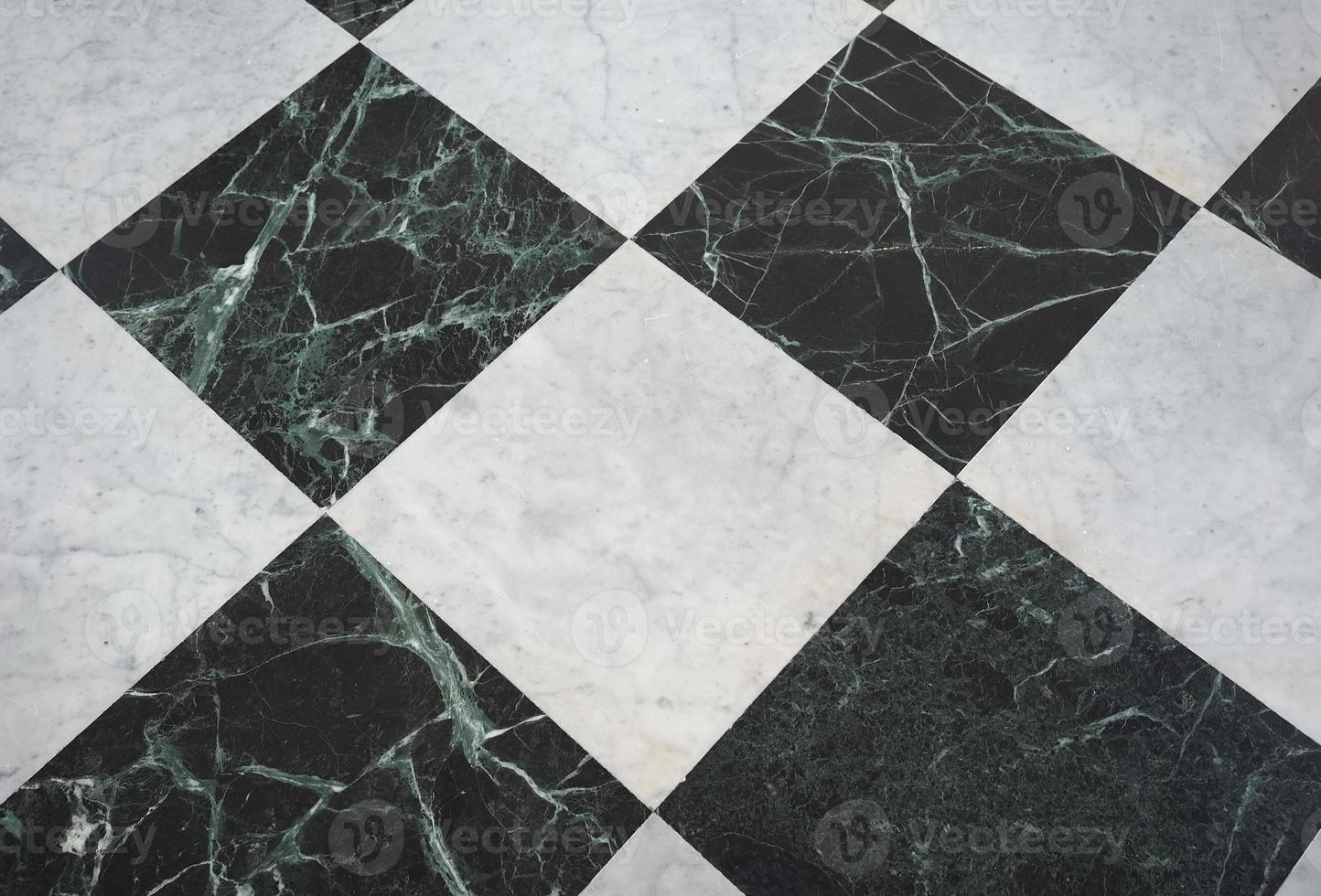 fundo xadrez branco verde e preto do piso de pedra foto