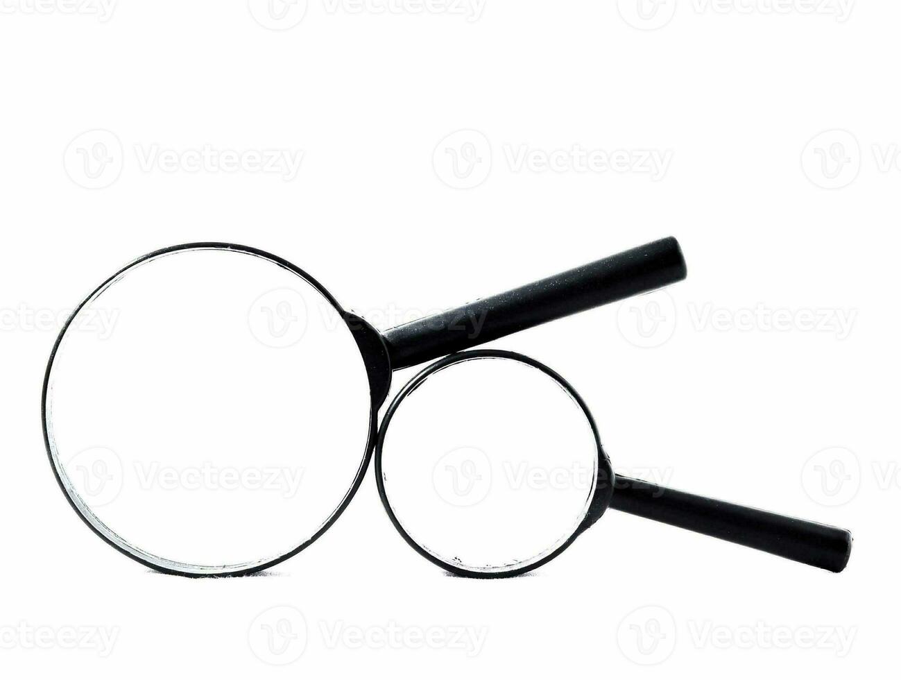 dois ampliação óculos em uma branco fundo foto