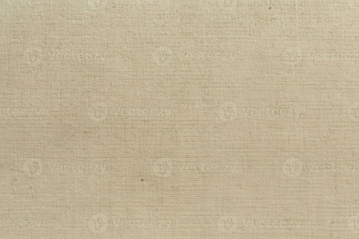 Castanho algodão tecido textura fundo, desatado padronizar do natural têxtil. foto
