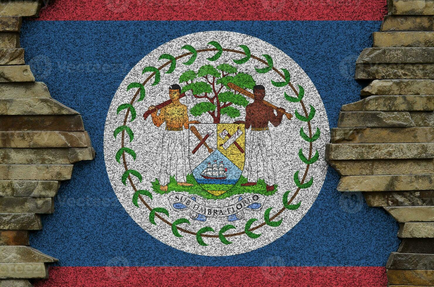 belize bandeira retratado dentro pintura cores em velho pedra parede fechar-se. texturizado bandeira em Rocha parede fundo foto