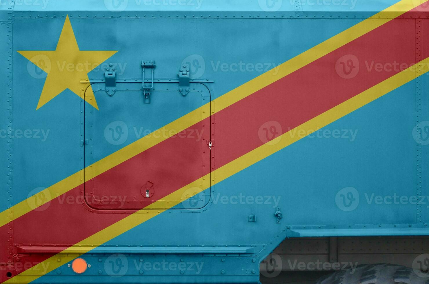 democrático república do a Congo bandeira retratado em lado parte do militares blindado caminhão fechar-se. exército forças conceptual fundo foto
