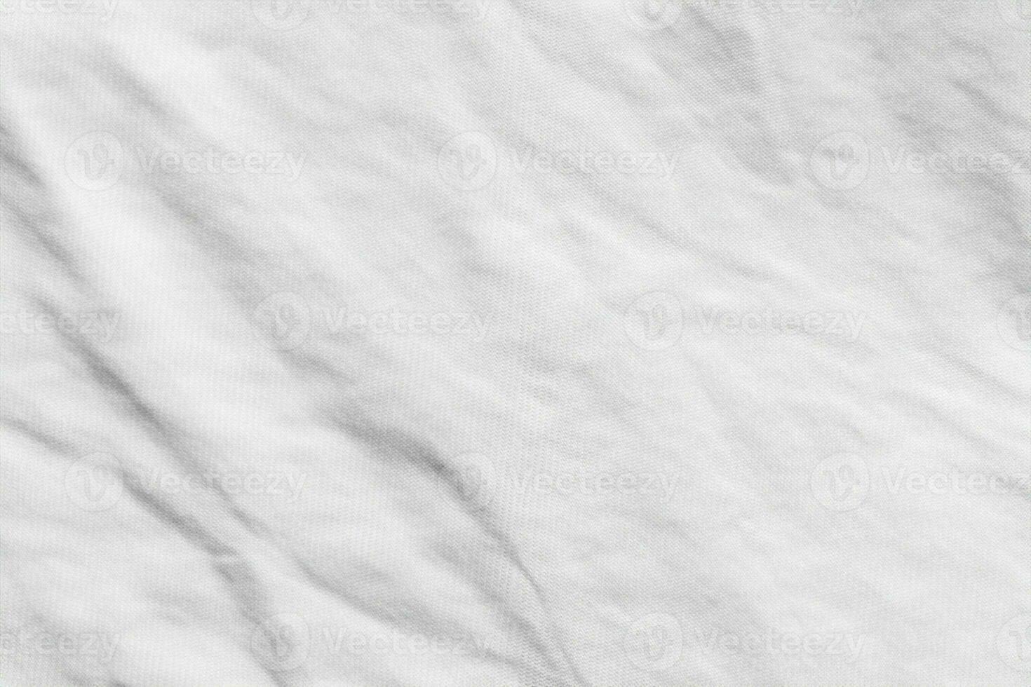 fundo de padrão de textura de pano de tecido de camisa de algodão de ruga branca foto