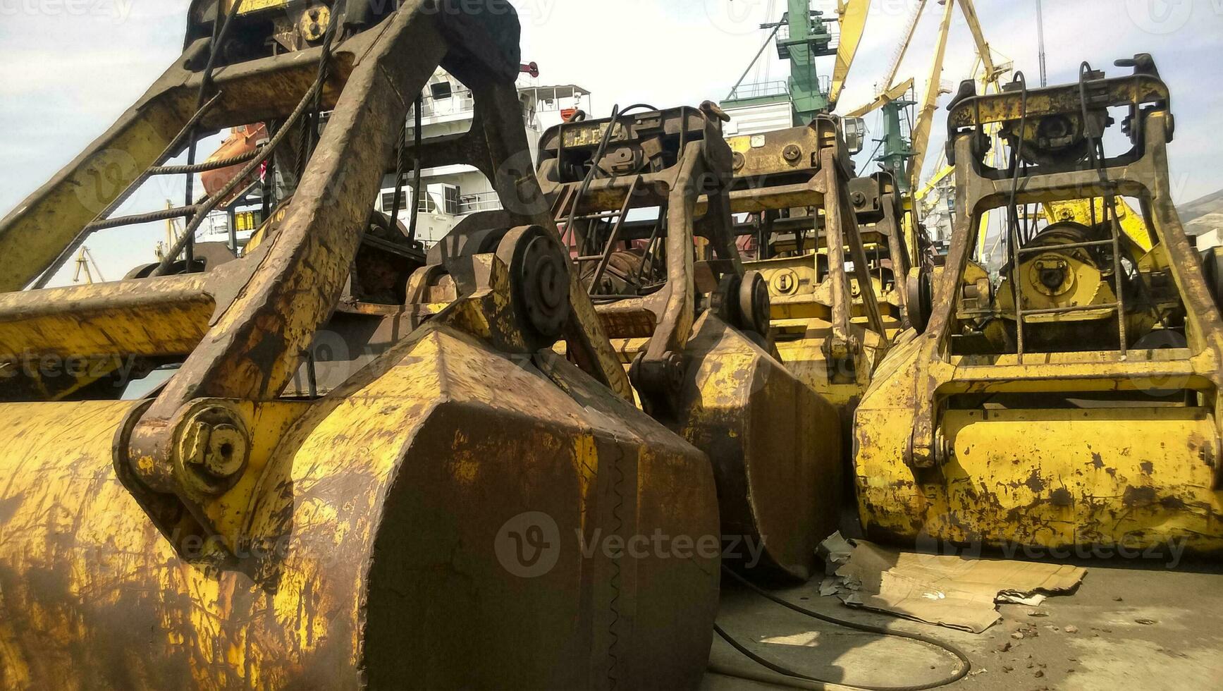 ampla baldes para porta carregadores. dreglayner, hidráulico e cabo dispositivos para emocionante solto material foto