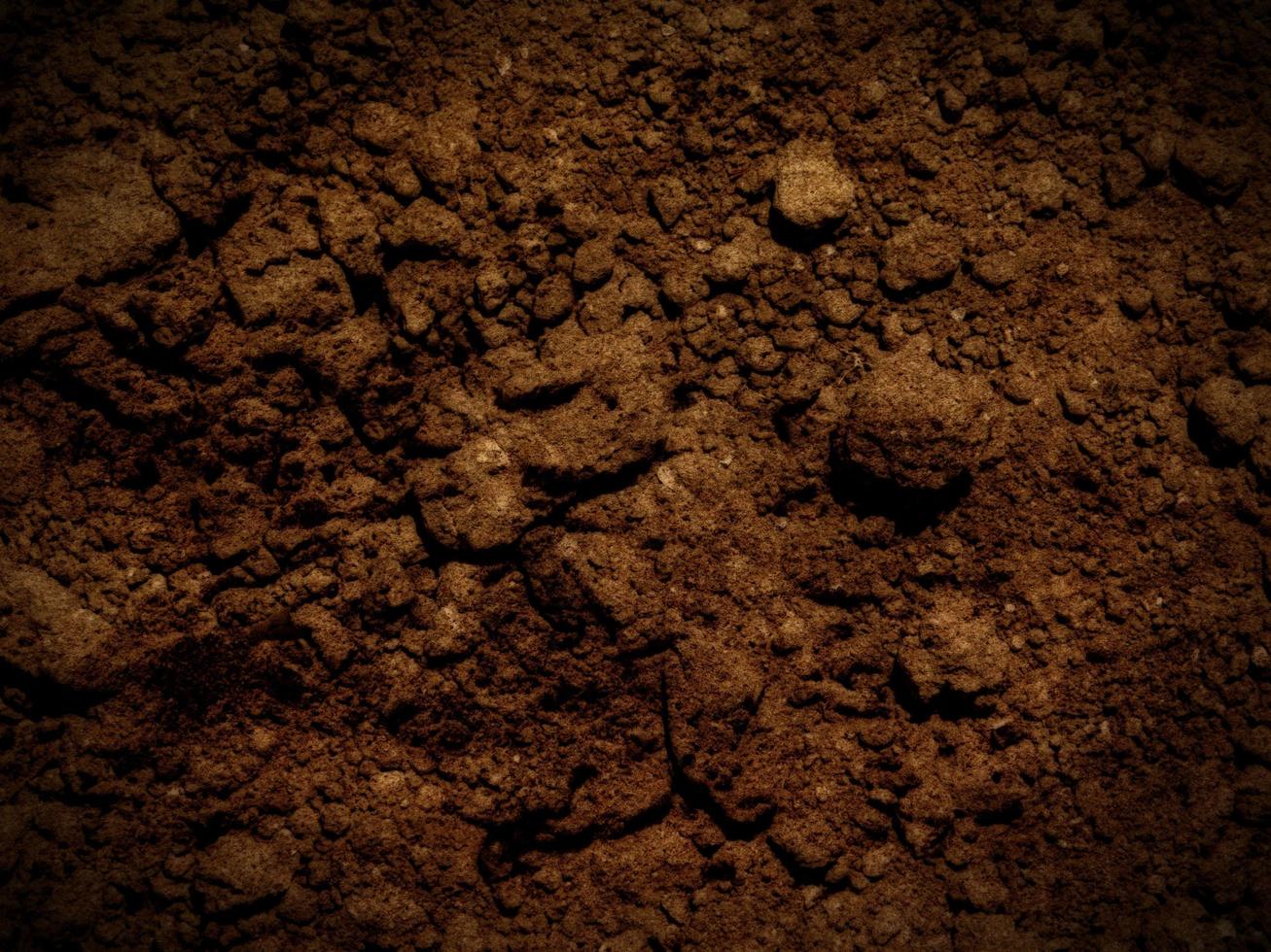 textura de terra escura foto