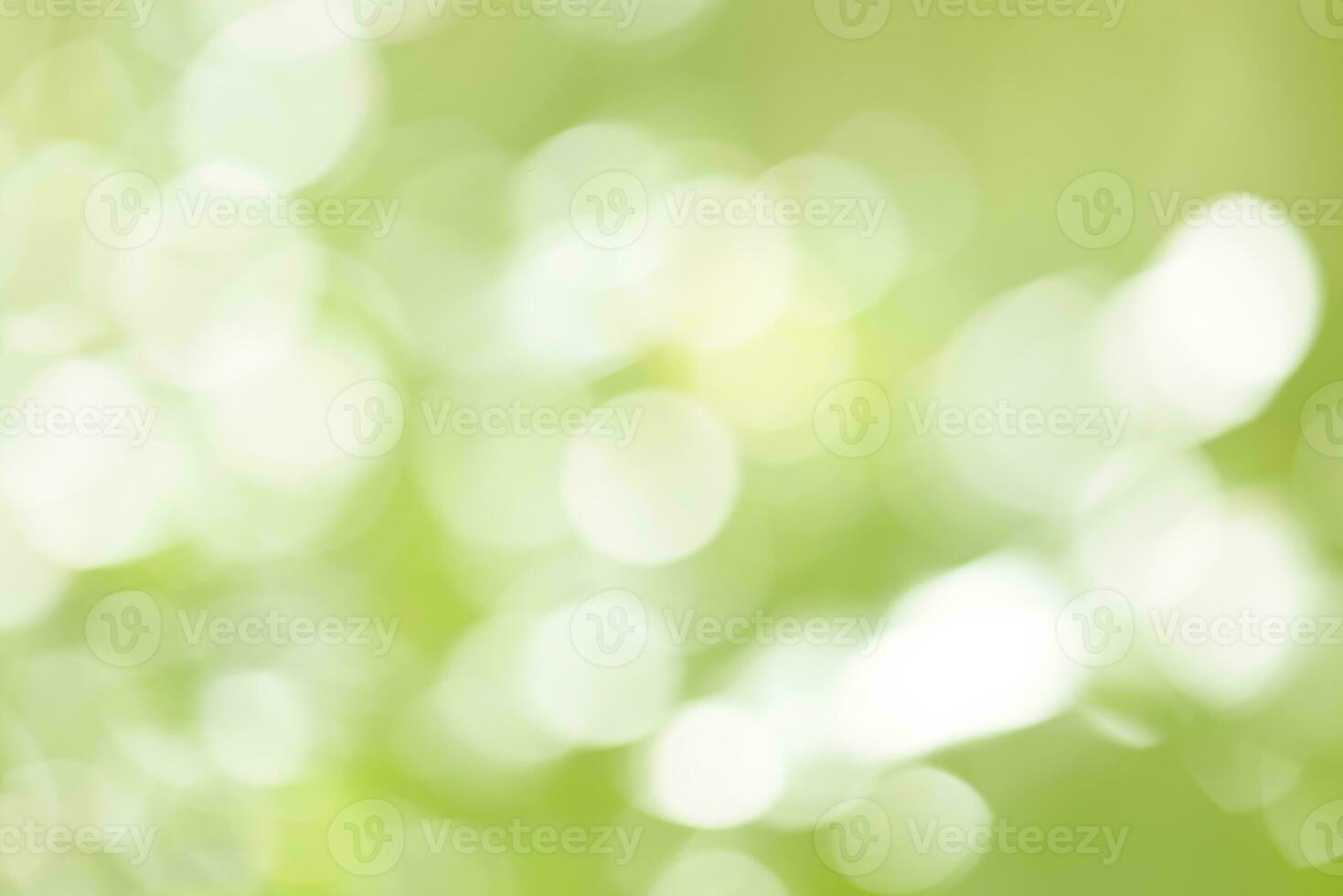 verde bokeh fundo. verde bokeh em natureza desfocar arte abstrato borrão fundo. foto