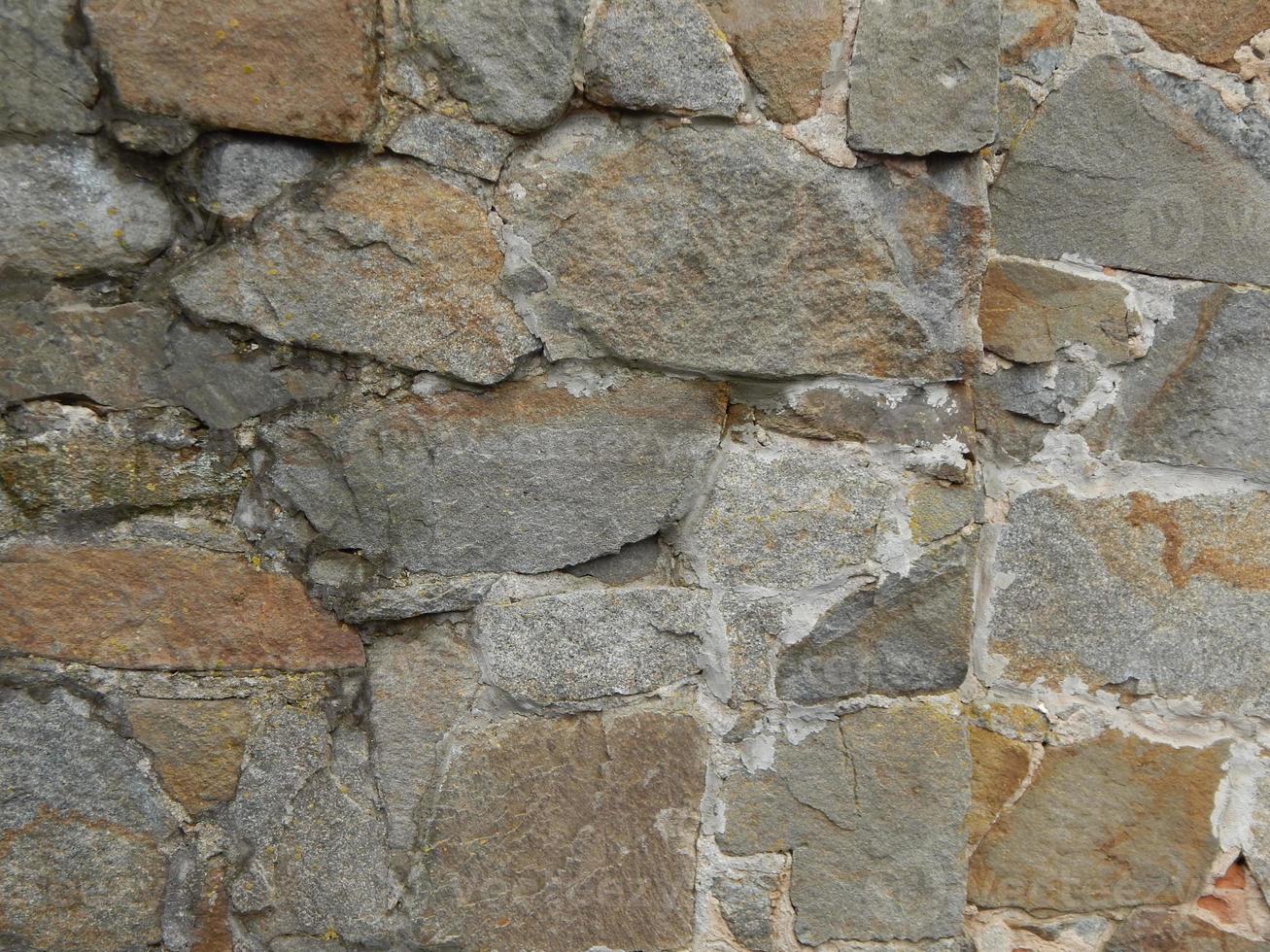 a textura do pavimento e paredes de pedra e tijolo foto