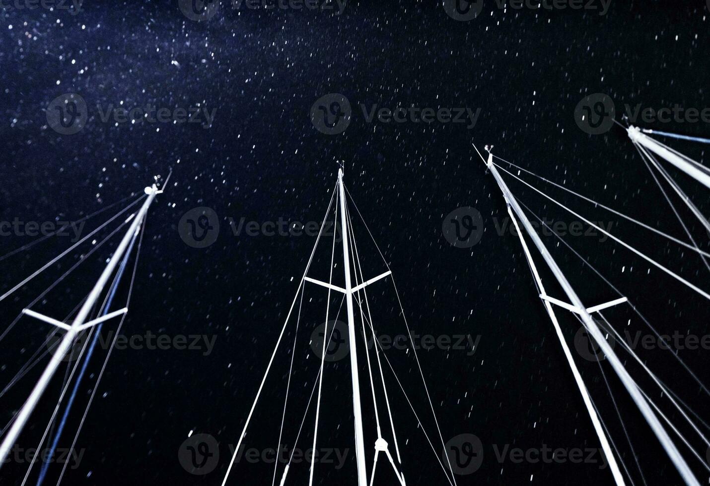 barco a vela mastro em estrelado céu fundo foto