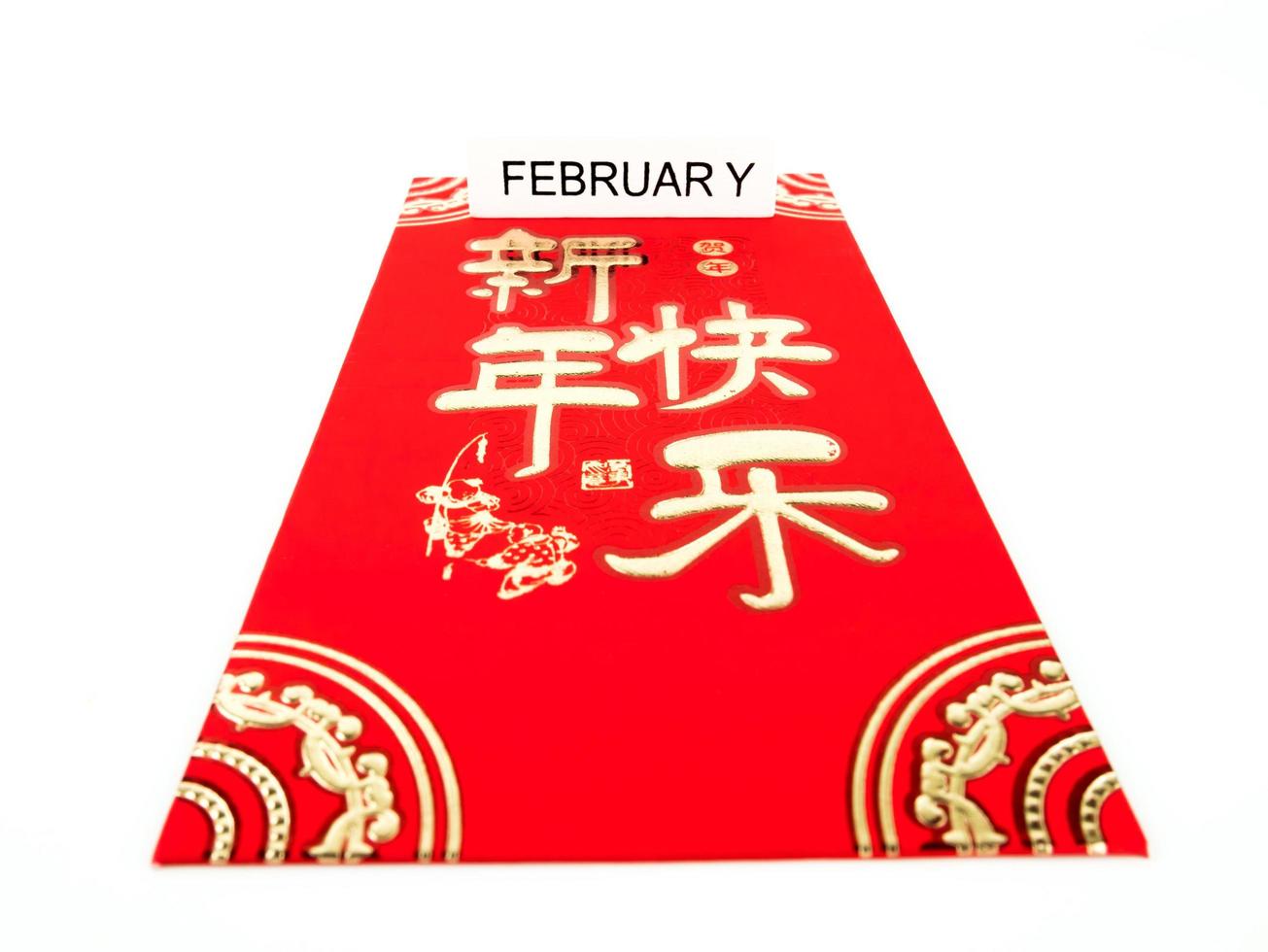 envelope vermelho isolado no fundo branco com fevereiro para presente ano novo chinês. texto chinês no envelope significa feliz ano novo chinês foto