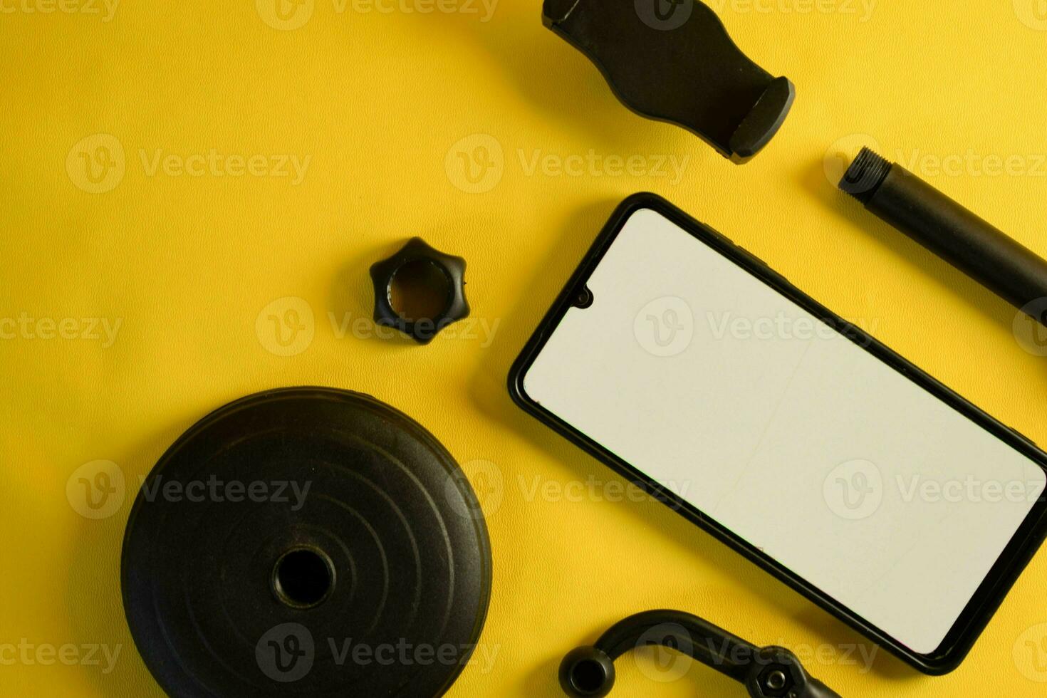 topo Visão do Smartphone com branco tela e partes do ficar de pé telefone ou mini tripé foto