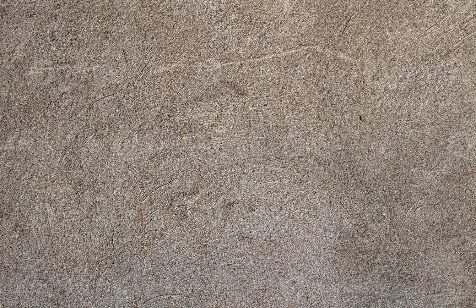 decoração antiga da parede externa riscada, cor cinza quente. textura foto