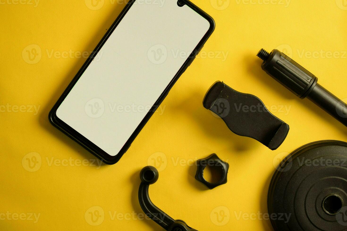 topo Visão do Smartphone com branco tela e partes do ficar de pé telefone ou mini tripé foto