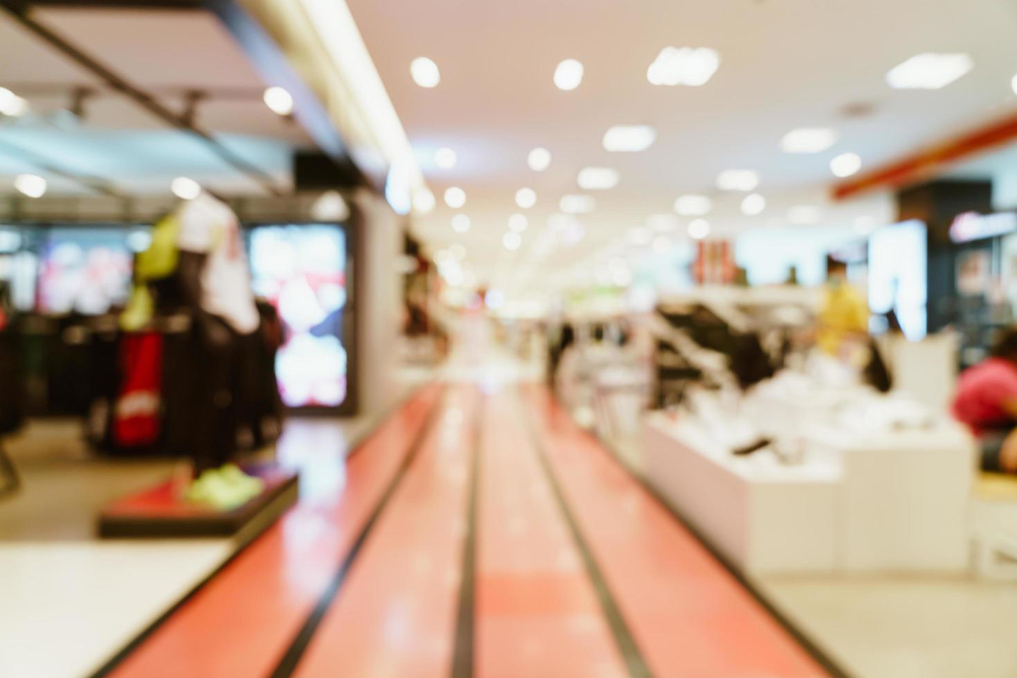 Resumo desfocar loja e loja de varejo em shopping para plano de fundo foto