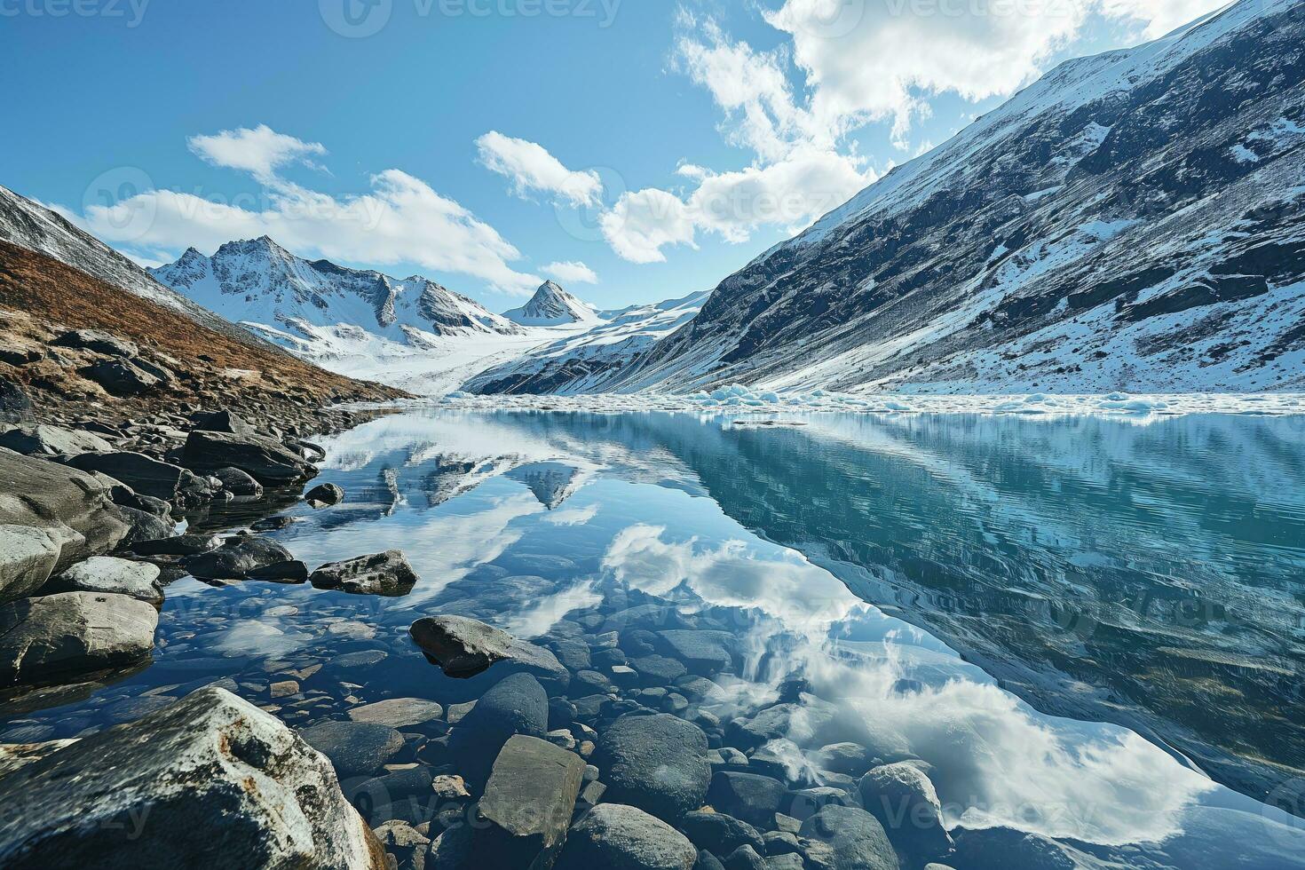 ai gerado mais puro terras altas lago com Claro fresco água entre Nevado montanha gamas foto