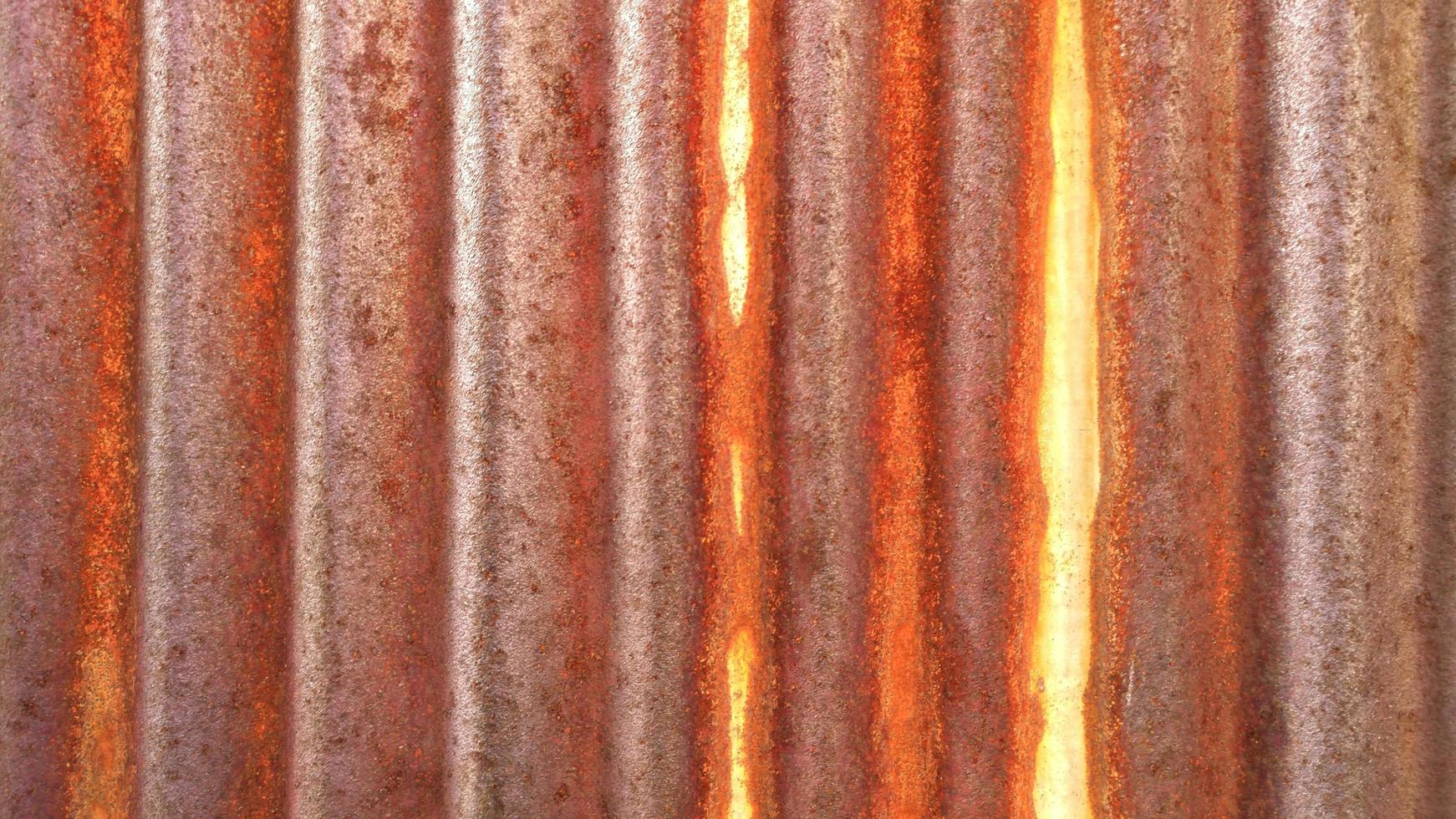 textura e fundo enferrujado da parede de zinco. foto