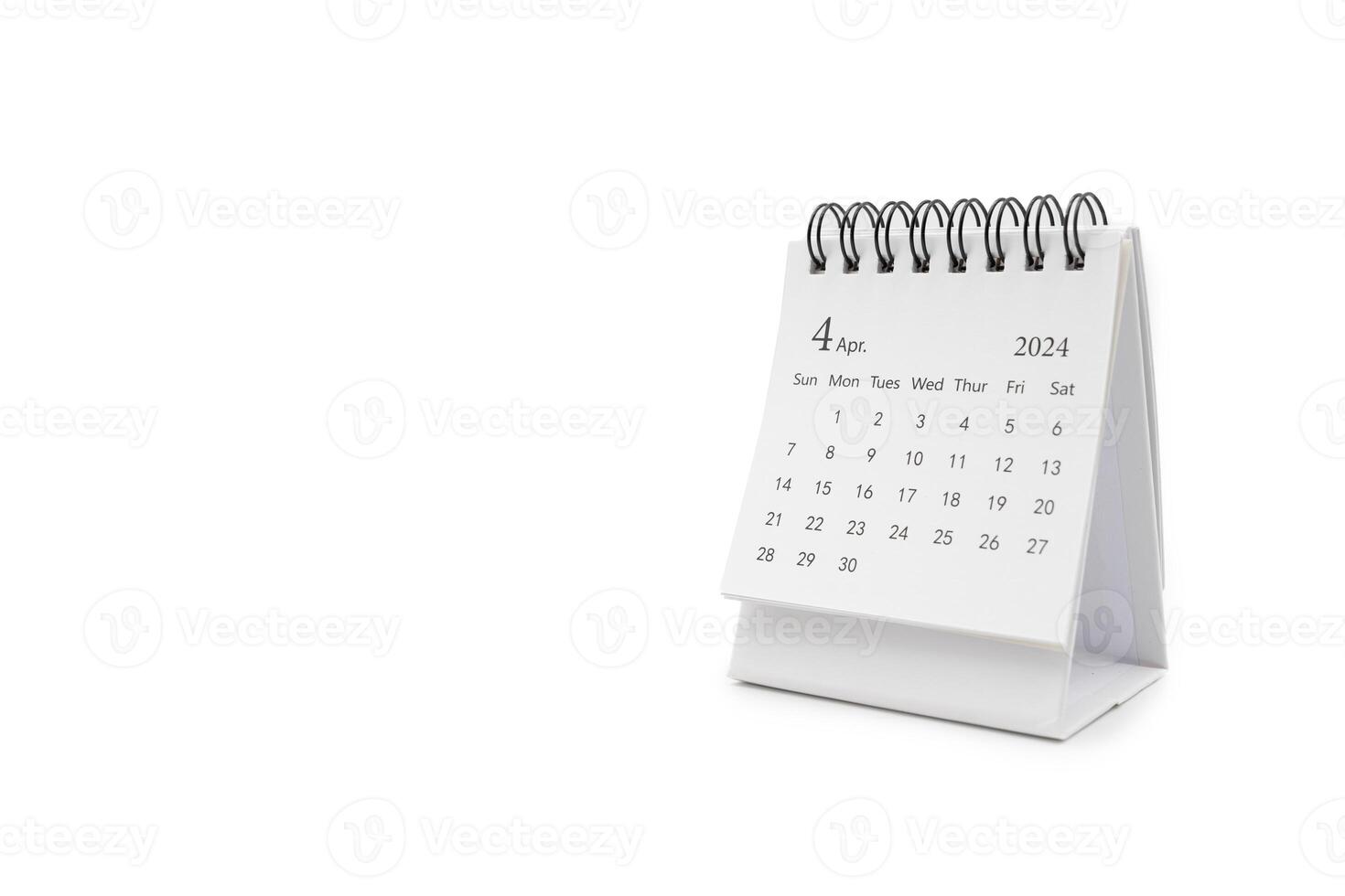 simples escrivaninha calendário para abril 2024 isolado em branco fundo. calendário conceito com cópia de espaço. foto