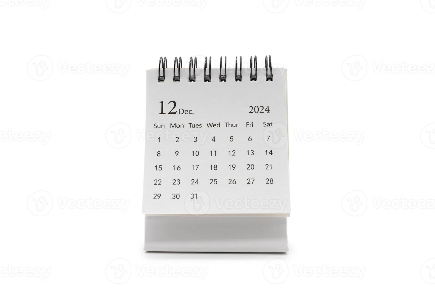 simples escrivaninha calendário para dezembro 2024 isolado em branco fundo. calendário conceito com cópia de espaço foto