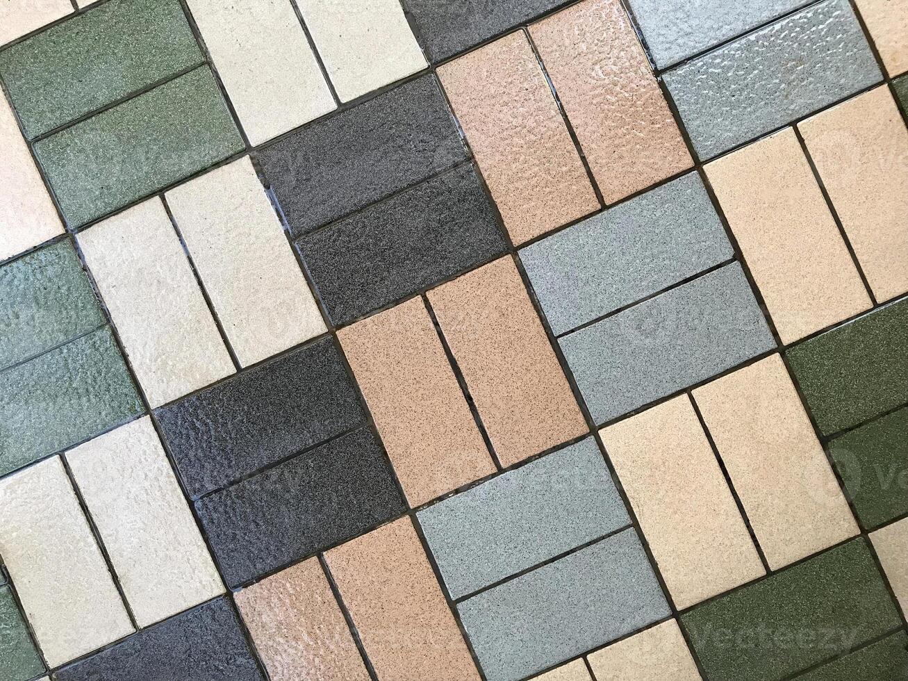 quadrado chão azulejos dentro muitos cores fundo foto