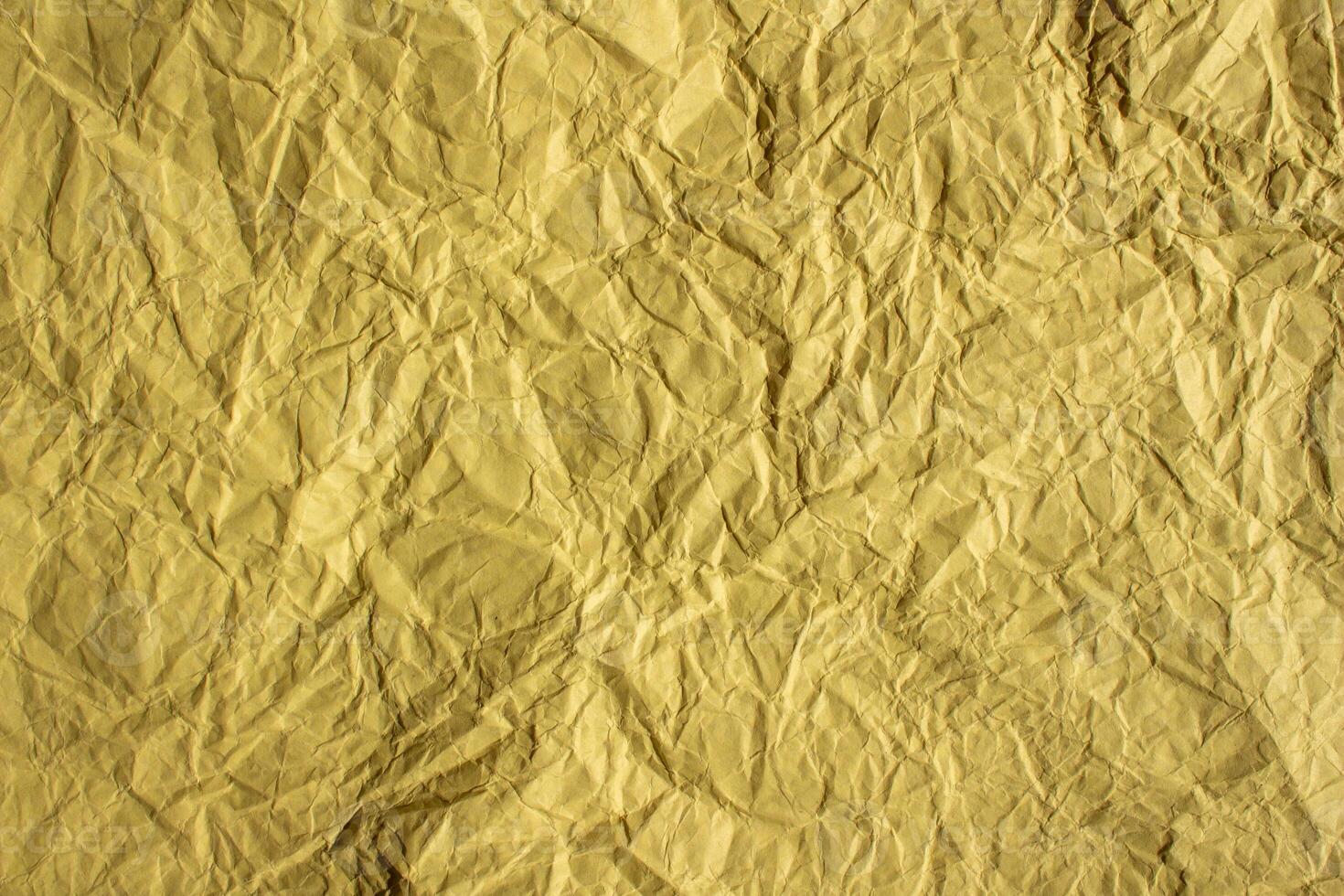 fundo de textura de papel amarelo amassado foto