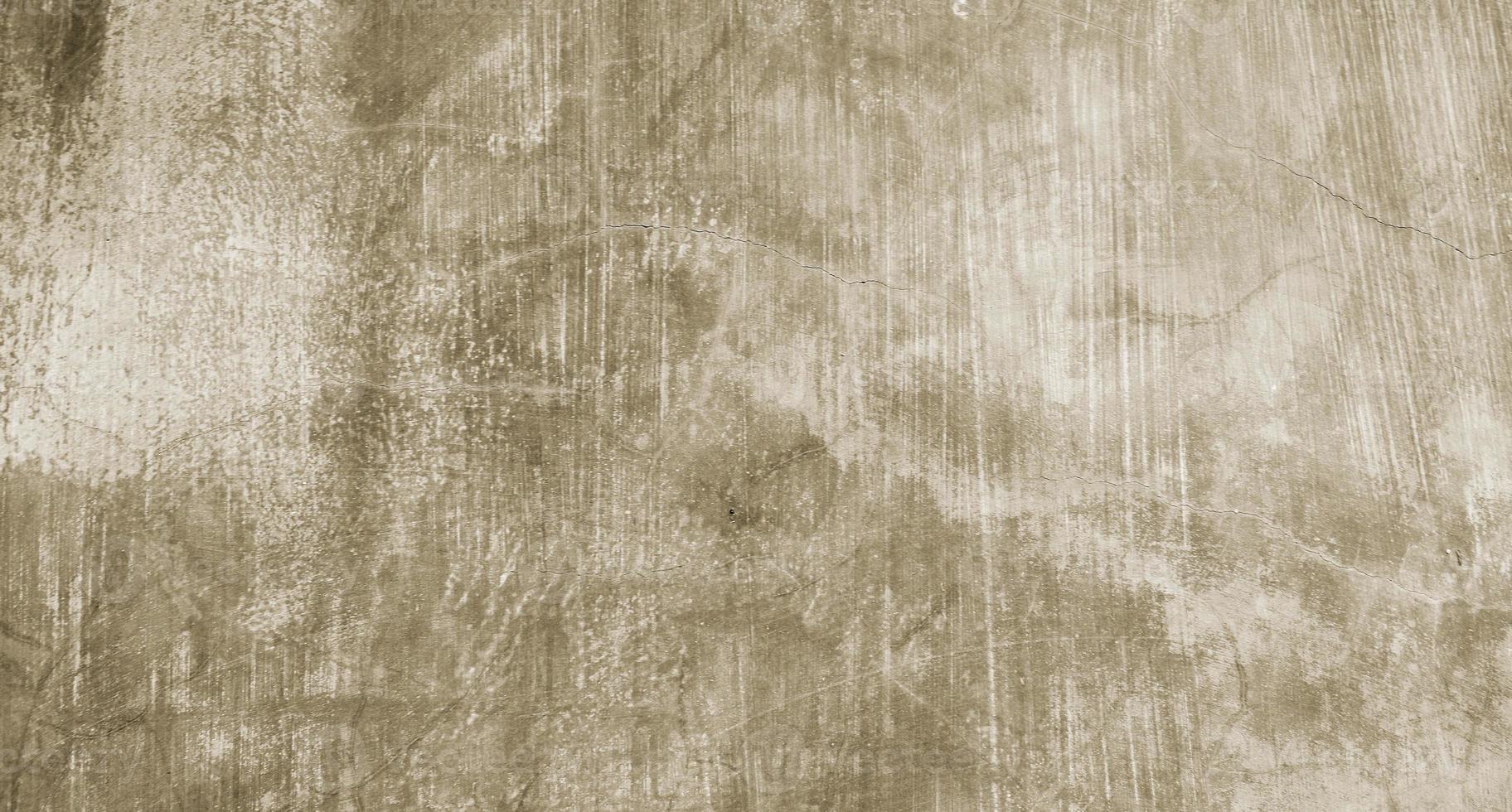textura de cimento rachado cinza para segundo plano. arranhões na parede foto