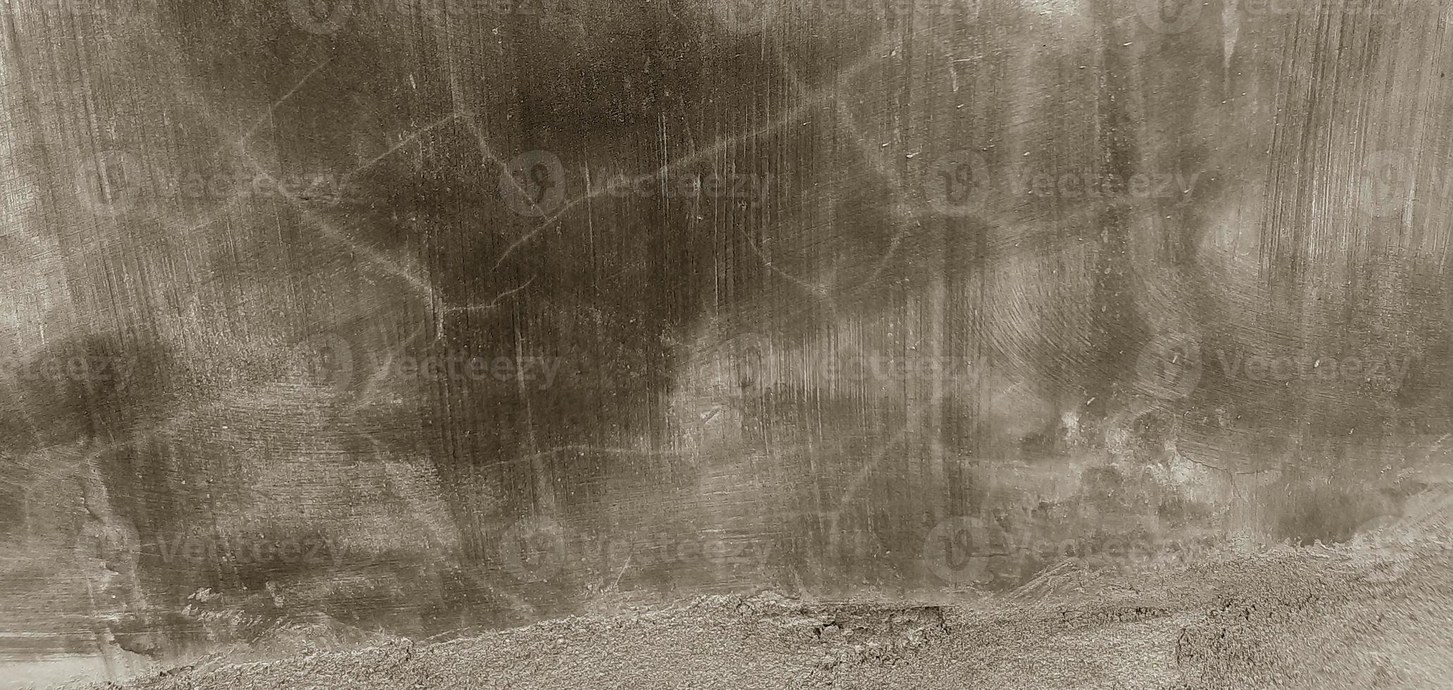 textura de concreto de cimento cinza. fundo de arranhões na parede foto
